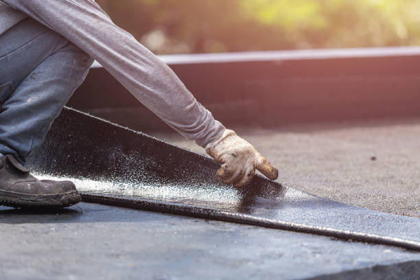 Professional Waterproofing technician working in Washburn, TN